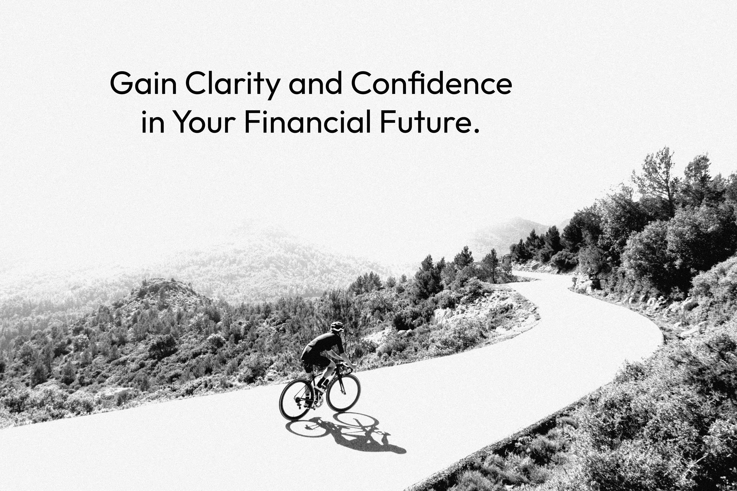 Tom Campbell wealth management post with a man on a bike riding through the mountains